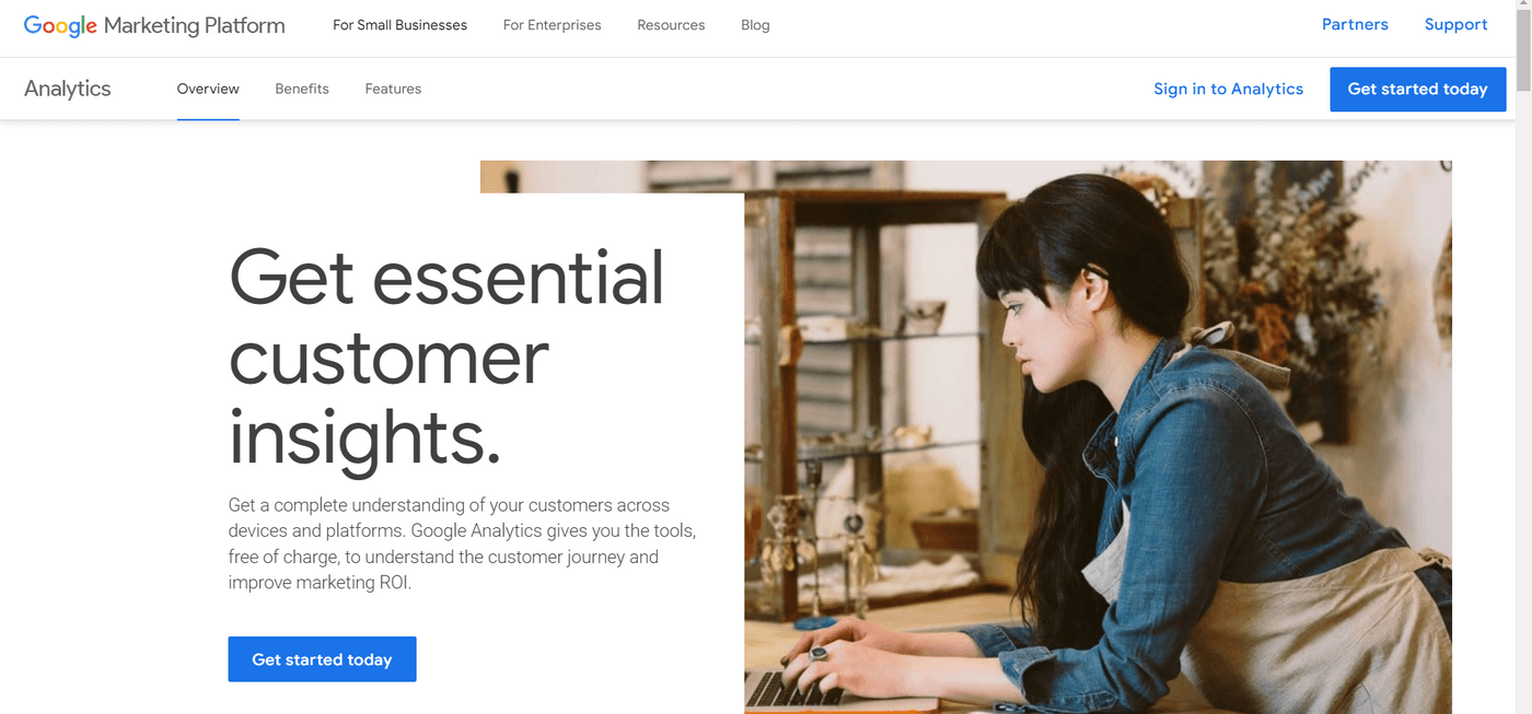 Google Marketing Platform Analytics page with text highlighting customer insights and a woman typing.