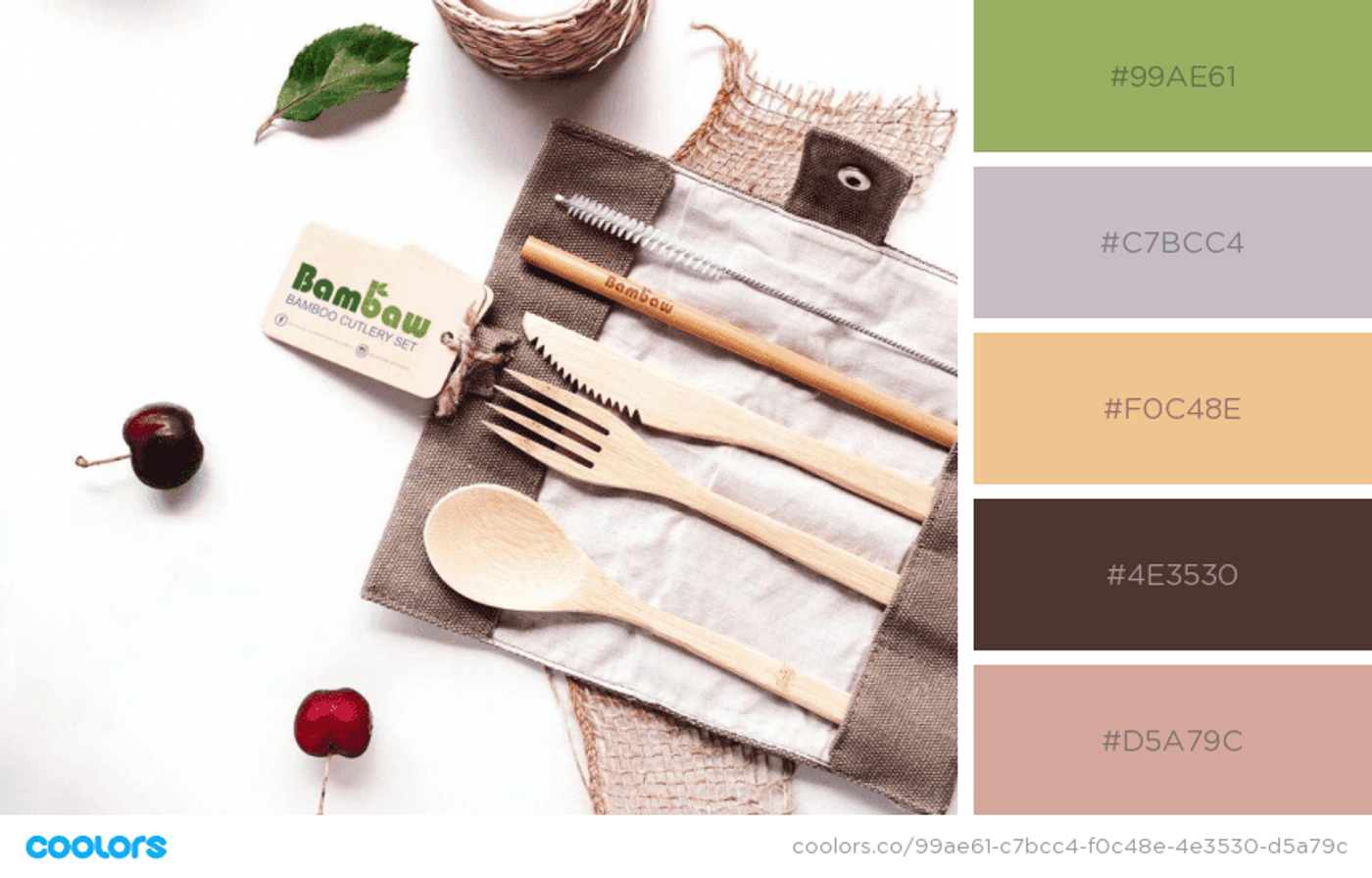 Utensílios de cozinha ecológicos em cores pastéis com um guardanapo de pano, colocados em uma mesa