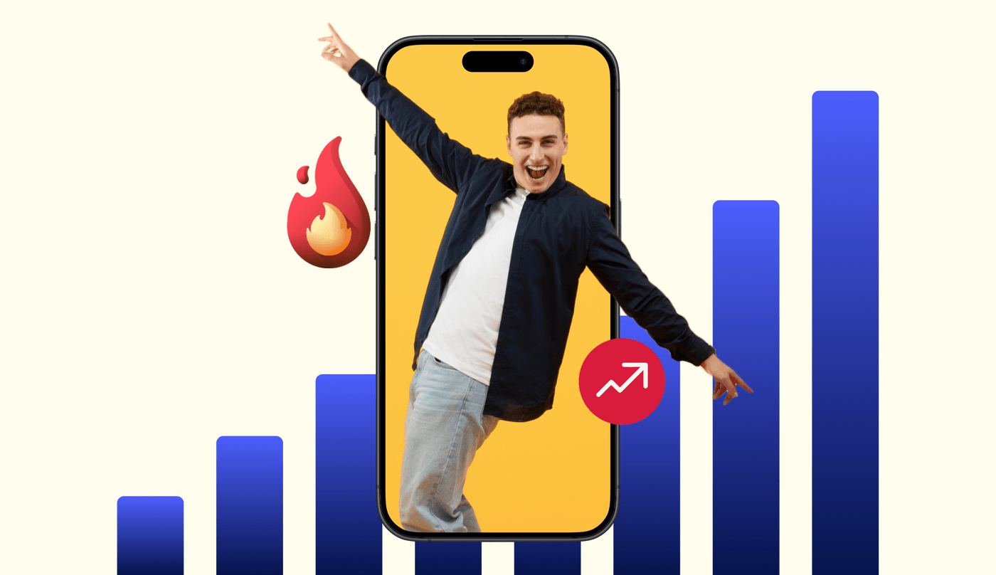 Excited man emerging from phone screen with rising chart, fire emoji, showcasing growth.
