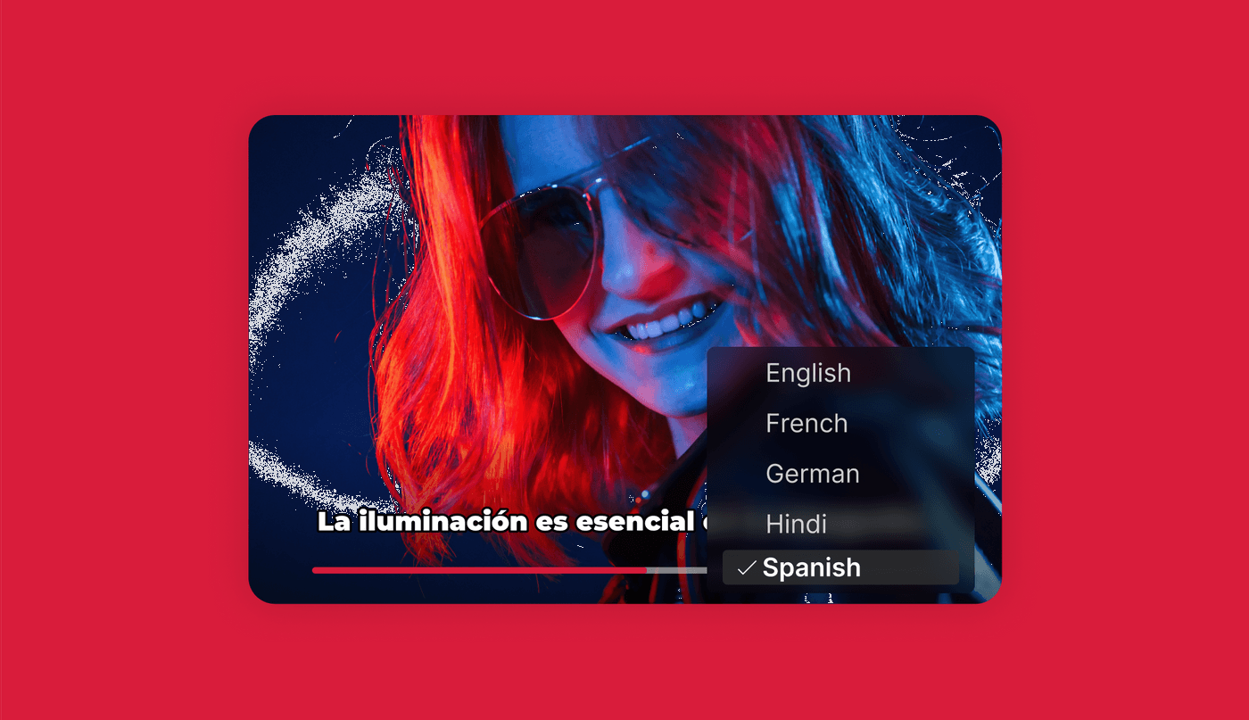 Red-haired woman, Spanish subtitles read 'La iluminación es esencial', language menu visible.
