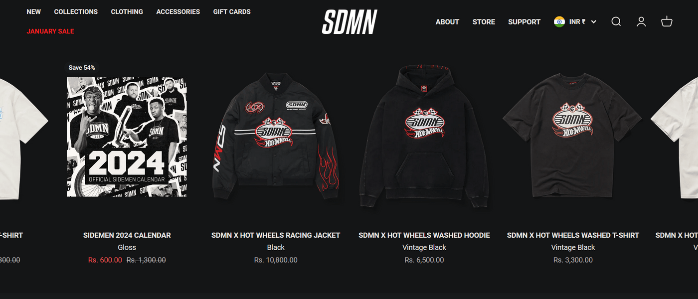 SDMN merchandise page showcasing 2024 calendar, jackets, hoodies, and t-shirts with pricing details.