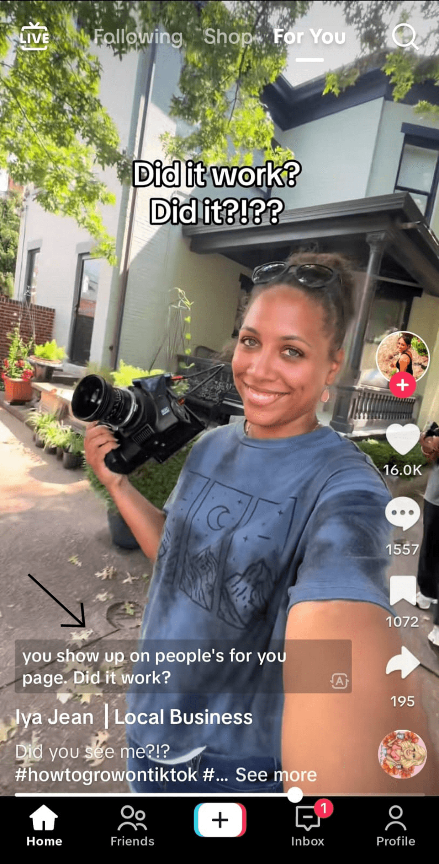 A woman holding a camera, asking if her video appeared on followers' For You page. Channel name: Iya Jean.