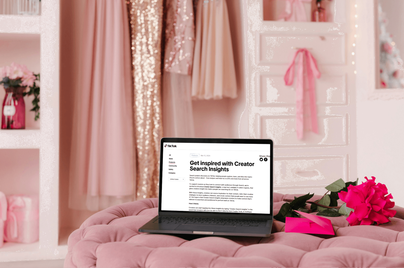 Laptop on pink couch showing TikTok Creator Search Insights page, surrounded by flowers and decor